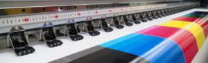 wide format printer printing a colorful banner